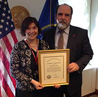  A. Rani Elwy, Ph.D., M.Sc., (left)recently received a Certificate of Appreciation from Robert Jesse, M.D., Ph.D., VA's Principal Deputy  Under Secretary for Health (right)